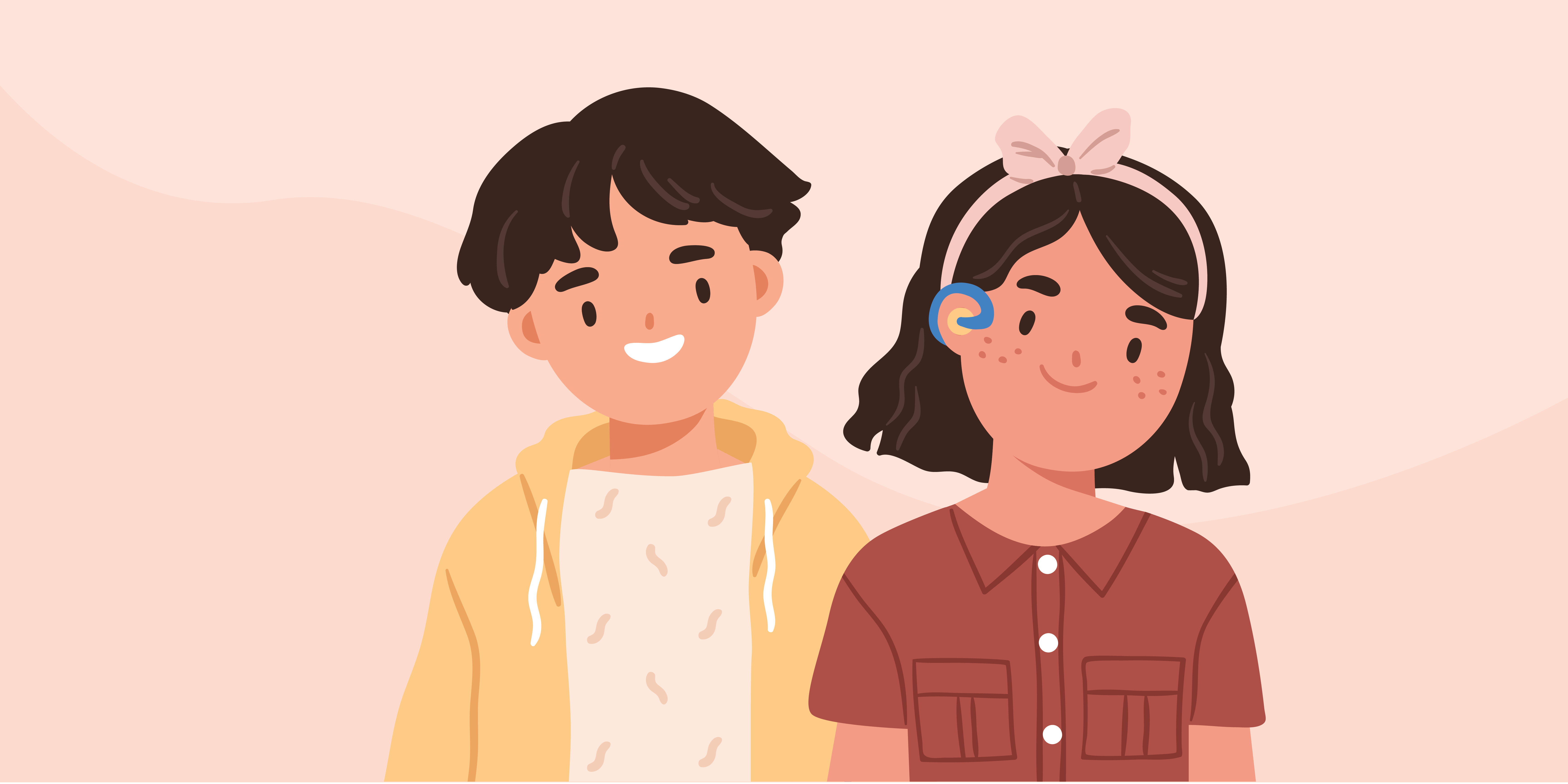 A young boy and a young girl with a hearing aid